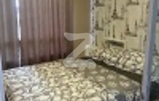 ห้องนอนพร้อมเตียงผ้าปูที่นอนอย่างดี